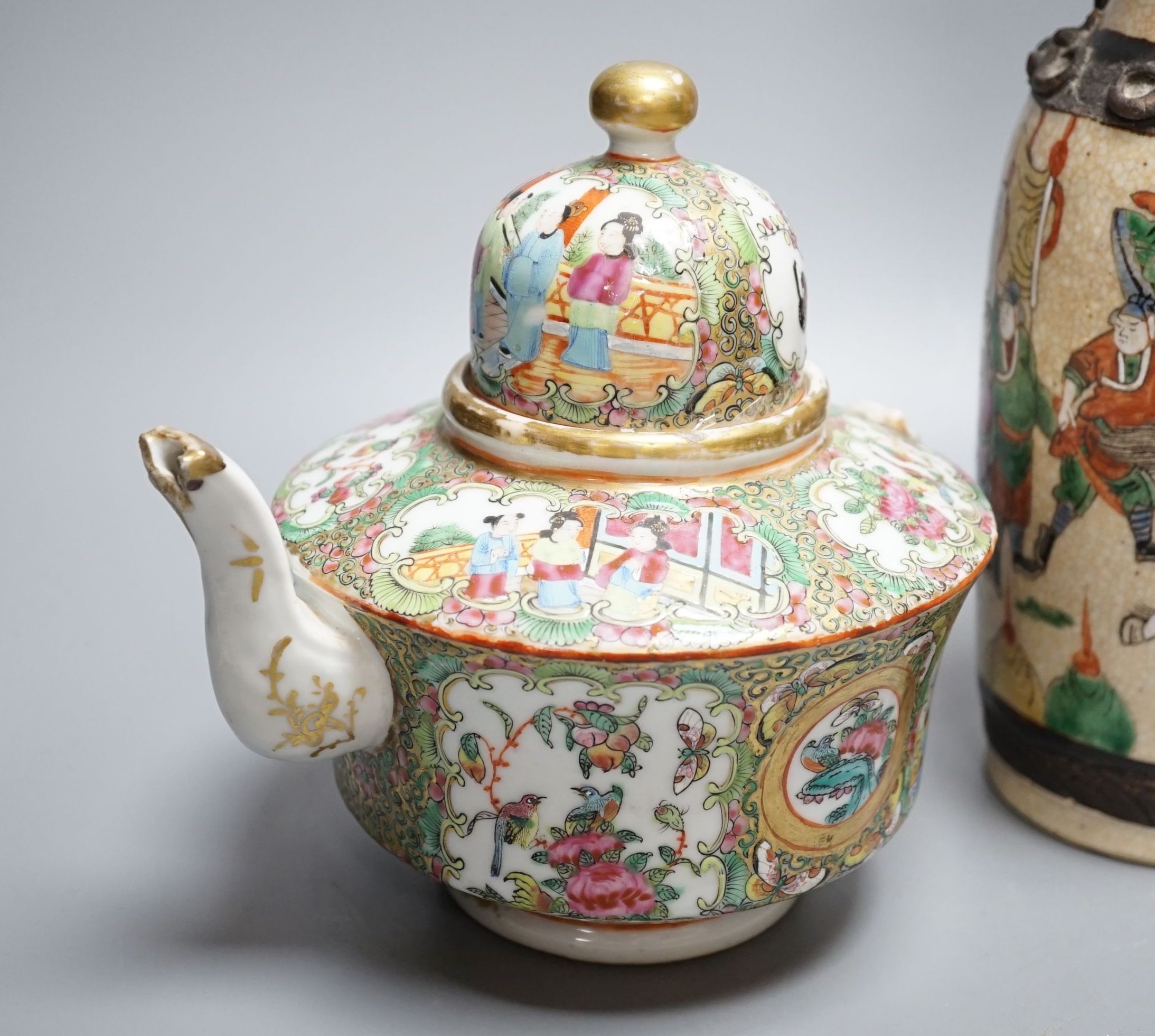 A Chinese famille rose crackleglaze vase, 29cm, together with a famille rose teapot and a crackleglaze celadon ground bottle vase